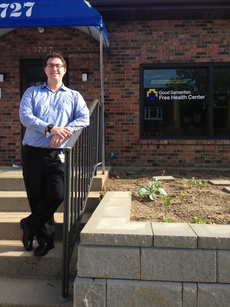 Garrett Rogers, our intern out front of Good Samaritan Free Health Center