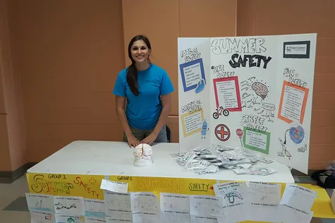 Julia Hunter's booth on summer safety at Project Connect